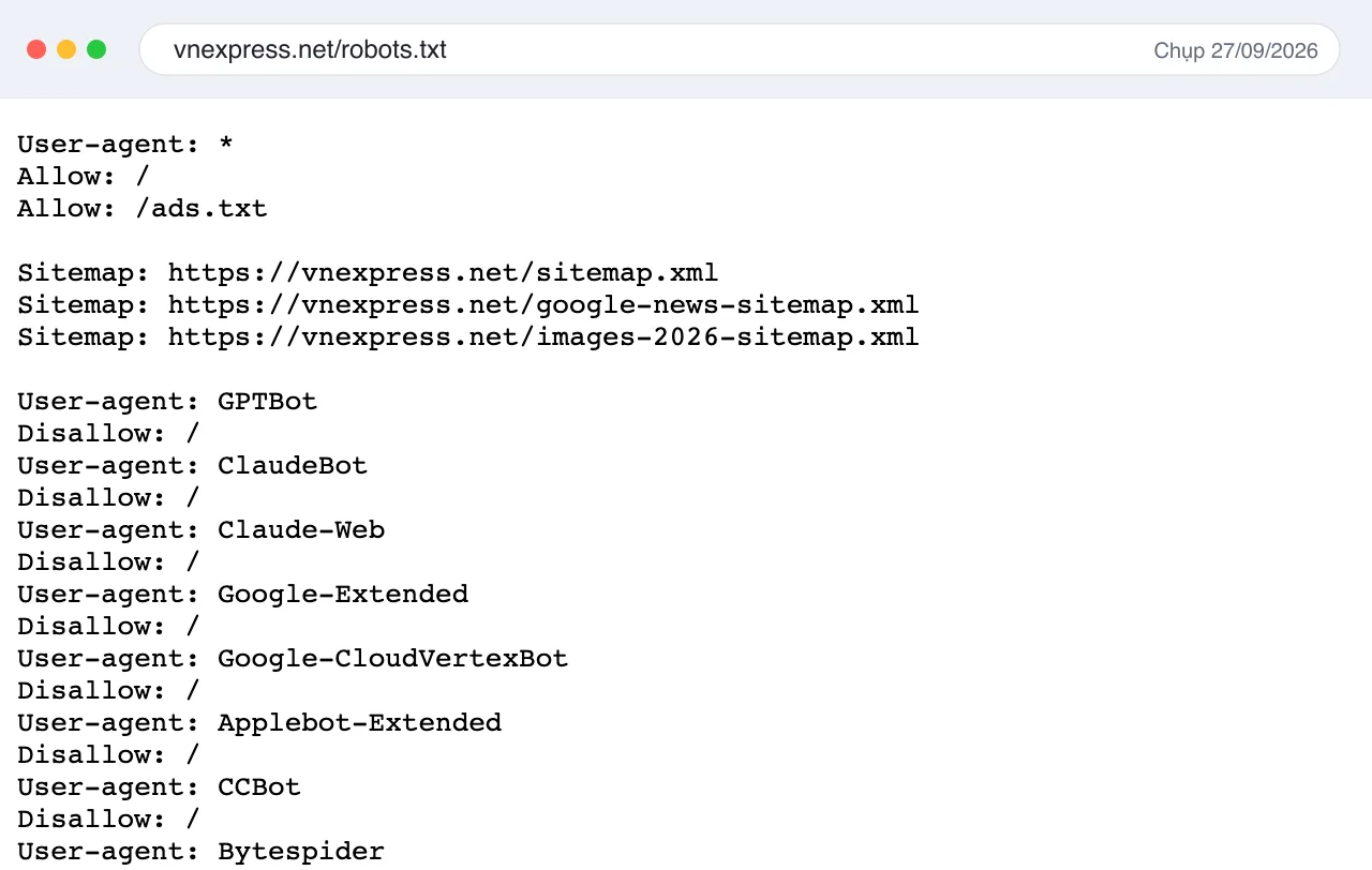 Robots.txt thật của VnExpress chụp ngày 27/09/2026, cho bot tìm kiếm truy cập nhưng chặn GPTBot, ClaudeBot, Google-Extended, CCBot và nhiều crawler AI khác